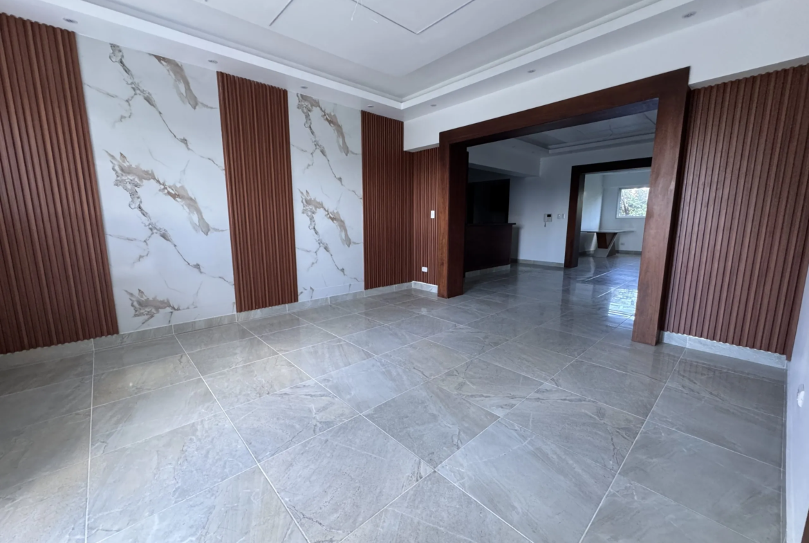 Apartamento con cocina Fría y Caliente, parqueos Techados en torre con Ascensor